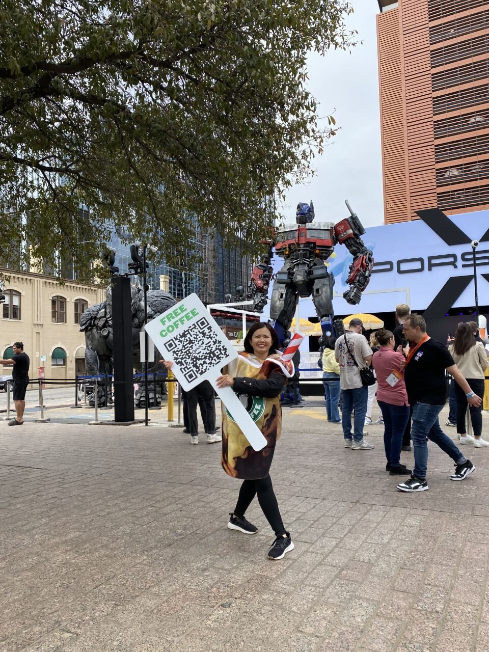 Street team ambassador with promotional signage